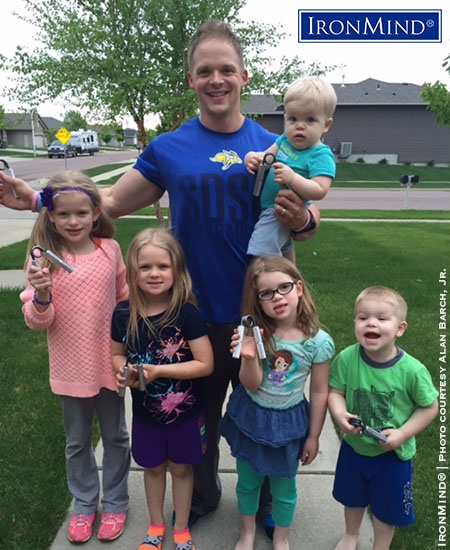 If you think taking care of your kids doesn’t mix with big accomplishments in the strength world, let Alan Barch Jr. inspire you: the man who told IronMind that his days include changing diapers, playing Barbie dolls and braiding hair has just been certified on the Captains of Crush No. 3.5 gripper! IronMind® | Photo courtesy of Alan Barch Jr.