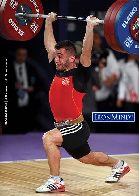 Showing his supremacy in the clean and jerk, Atak Hursit (Turkey) made 170 kg on his third attempt, winning the gold medals in the jerk as well as the total in the men’s 62-kg class at the 2016 European Weightlifting Championships. IronMind® | ©Randall J. Strossen photo