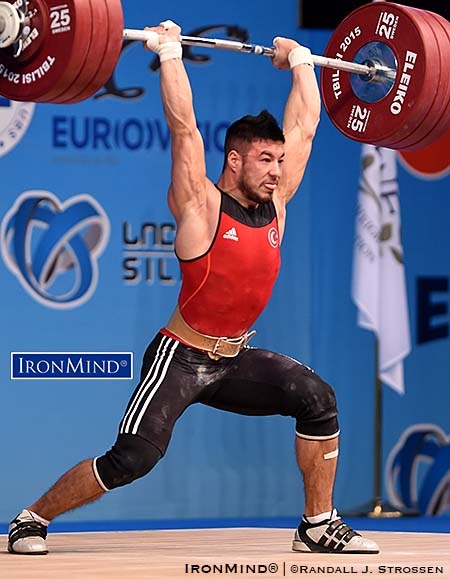 Tbilisi—Continuing his push to the top, Daniyar Ismayilov (Turkey) posted a world class 337-kg total to win the 69-kg category at the European Weightlifting Championships.  As his total keeps increasing, Turkey’s Daniyar Ismayilov is on a trajectory that could make him the man to beat in the 69-kg category. IronMind® | Randall J. Strossen photo