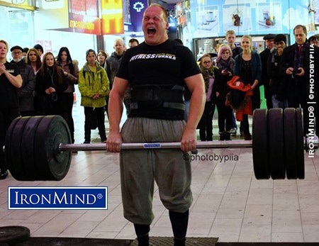 Eirik Bruun Ingebretsen, who will be one of the favorites, shown “hauling up the IronMind Apollon’s Axle at the 2013 IronMind Grip Classic.” Photo ©photobypiia.com