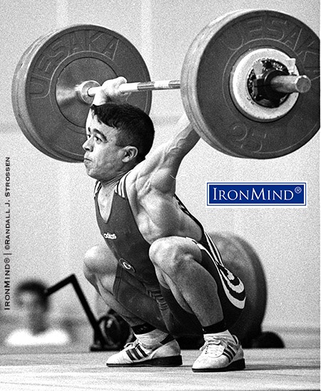 Halil Mutlu and his 137.5 kg world record snatch in the 56-kg class at the 1999 World Weightlifting Championships. IronMind® | ©Randall J. Strossen photo