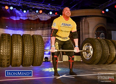 Battling weather delays and traveling for 32 hours, JF Caron impressively won the 350kg Axle Deadlift at SCL FIBO with 11 reps, tying the mighty Zydrunas Savickas’ record. IronMind® | Courtesy of Strongman Rage