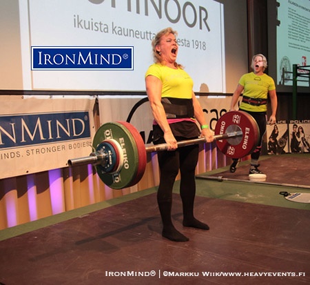 Jaana Tanner pulls a Finnish record on the Apollon’s Axle double overhand deadlift (109 kg) at the 2015 United Strongman World Grip Championships. IronMind® | ©Markku Wiik/www.heavyevents.fi