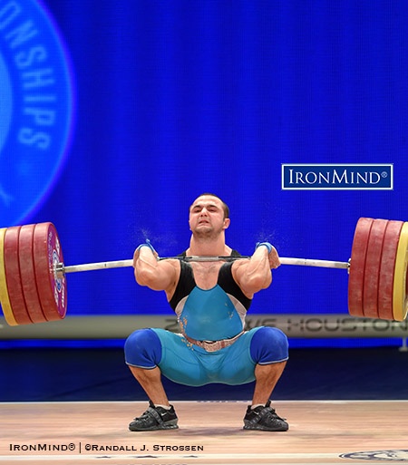 After he had secured the gold medal in the clean and jerk, as well as in the total, in the men’s 77-kg category at the 2015 IWF World Championships, Nijat Rahimov (Kazakhstan) called for a world record attempt of 211 kg. He racked the bar, but could not stand up with it. IronMind® | ©Randall J. Strossen