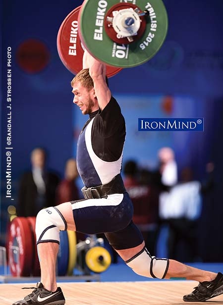 With this wide, deep split, Oleg Sirghi stuck the jerk on 151-kg, good for the gold medal in both the clean and jerk and the total in the men’s 56-kg class at the 2015 European Weightlifting Championships. IronMind® | Randall J. Strossen photo