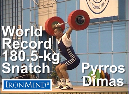 The great Pyrros Dimas and his world record 180.5-kg snatch at the 1999 World Weightlifting Championships. IronMind® | ©Randall J. Strossen