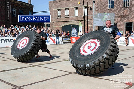 Grzegorz Szymanski and Zydrunas Savickas go head-to-head during the tire flip at SCL Holland. At the end of the day, Szymanski won three out of the six events. IronMind® | Photo courtesy of Aryn Lockhart/Strongman Rage