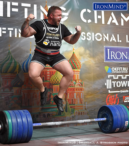 Andrey Sharkov celebrates his 215-kg success on the Apollon’s Axle. IronMind® | ©Randall J. Strossen photo