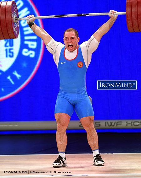 Artem Okulov had good reason to smile—he’d just completed his third good snatch (176 kg) in the men’s 85-kg category at the IWF World Championships. Okulov ended the evening with one silver and two gold medals. IronMind® | ©Randall J. Strossen photo