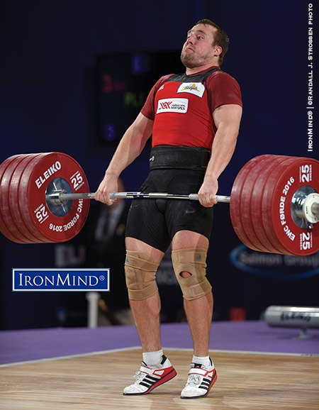 For the money: Arturs Plesnieks (Latvia) finishes the pull on his 226-kg third attempt clean and jerk. Plesnieks made the lift, thereby claiming the jerk and total gold medals in the men’s 105-kg category at the 2016 European Weightlifting Championships. IronMind® | ©Randall J. Strossen photo