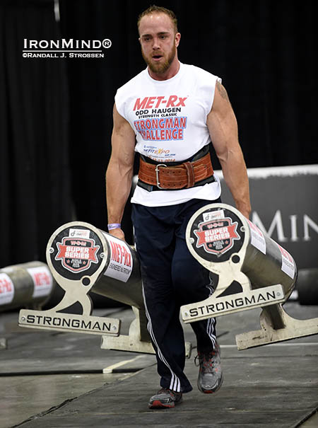 Jon-Clark Eklund won the Farmer’s Walk for distance at the Odd Haugen Strength Classic today and in between events, at the midway point in the strongman contest, he officially closed the Captains of Crush No. 3 gripper. IronMind® | Randall J. Strossen photo
Jon-Clark Eklund won the Farmer’s Walk for distance at the Odd Haugen Strength Classic today and in between events, at the midway point in the strongman contest, he officially closed the Captains of Crush No. 3 gripper. IronMind® | Randall J. Strossen photo