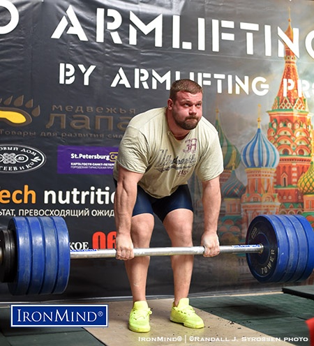 The future of the Apollon’s Axle double overhand deadlift: Kirill Saryshev takes a solid crack at 240 kg. IronMind® | ©Randall J. Strossen photo