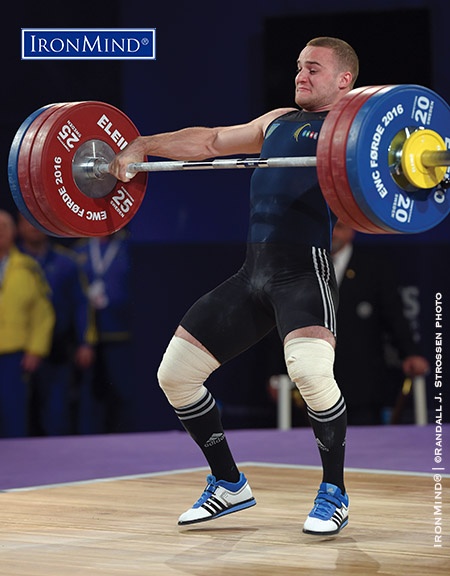 Oleksandr Pielieshenko (Ukraine) pulls himself under this 168-kg snatch at the 2016 European Weightlifting Championships. IronMind® | ©Randall J. Strossen photo