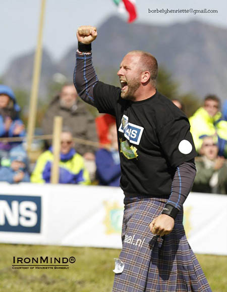 Pieter Karst Buoma celebrates his victory at the 2014 IHGF Amateur Highland Games World Championships.  IronMind® | Image courtesy of Henriette Borbely