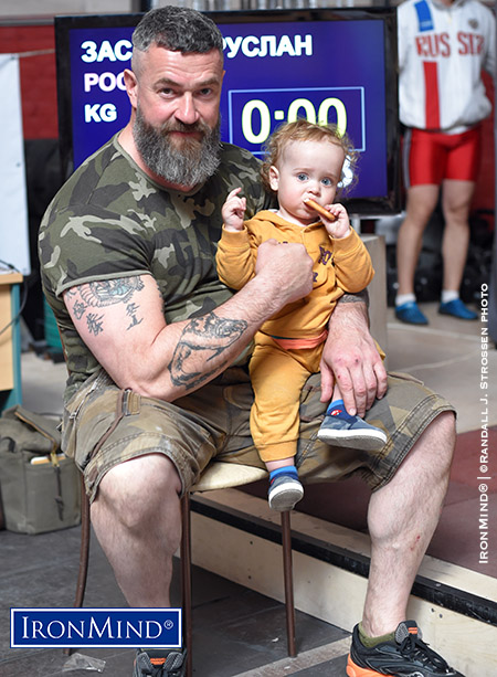 APL president and Russian media star Sergey Badyuk with his son Akim, whom Sergey describes as “future world champion.” IronMind® | ©Randall J. Strossen