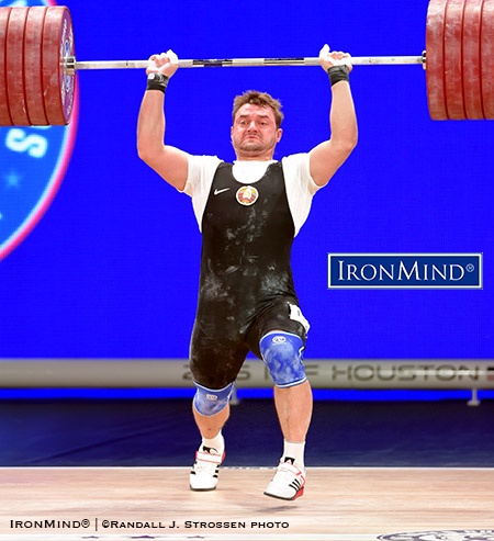 Vadzim Stralsou drove himself under this 230-kg jerk that gave him the gold medal as well as the overall victory in the men’s 94-kg class at the International Weightlifting Federation World Championships. IronMind® | ©Randall J. Strossen photo