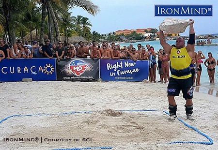 Jimmy Paquet Wins SCL Curacao Dainis Zageris on the Rock Lift at SCL Curacao. IronMind® | Image courtesy of SCL