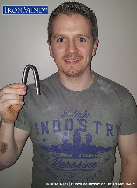 brian mcshane IronMind Red Nail “I am a gym owner and personal trainer. I am extremely interested in everything strength related,” Brian McShane told IronMind. Well, how’s this for another strength world feather in his cap: McShane has just been certified on the IronMind Red Nail, giving himself bragging rights in the world of steel bending. IronMind® | Photo courtesy of Brian McShane