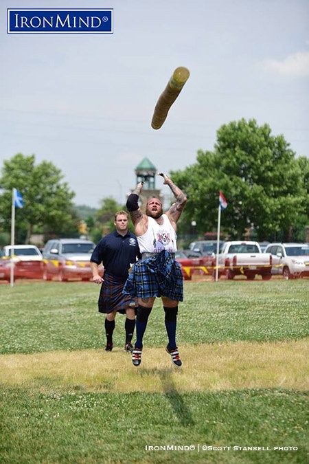 Dan Tennison, who won the IHGF All-American Caber Tossing Championship, turned three 12 o’clocks on the caber (under the watchful eye of professional Highland Games world champion Dan McKim, who served as a referee), as part of his winning performance at the 2016 Kansas City Highland Games.  IronMind® | ©Scott Stansell photo