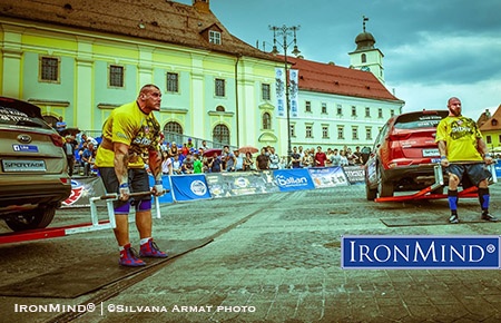 Mateusz Baron (Poland) squares off  against Romanian Vladimir Comorovschi (Romania) in the deadlift at SCL Romania 2016. IronMind® | ©Silvana Armat photo
