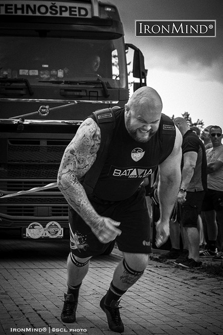 Stefan Solvi Petursson (shown on the bus pull) is the world record holder for the 400-kg farmer’s walk: that record will be attacked at SCL Bulgaria this coming weekend, July 23-24. IronMind® | Photo courtesy of SCL