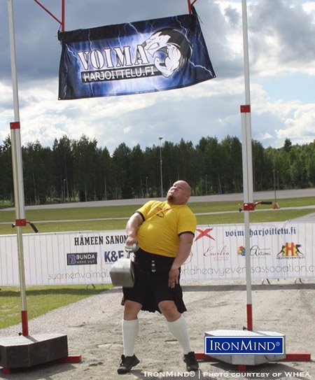 Henri Pakisjärvi in weight for height, on his way to winning the Finnish Highland Games Championships. IronMind® | Photo courtesy of WHEA