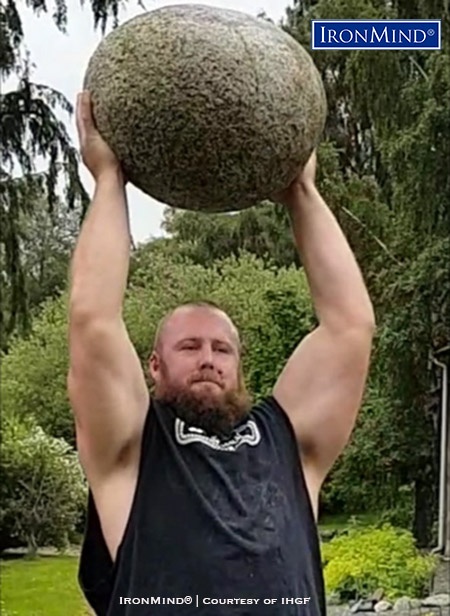 Luke Reynolds (Australia) puts the most famous of all manhood stones—Scotland’s Inver stone—overhead. Reynolds will be competing in the IHGF Stones of Strength World Challenge in Fefor, Norway. IronMind® | Courtesy of IHGF