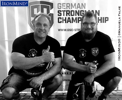Daniel Isernhagen (right) extends Germany’s proud tradition in the grip strength world as he completed the Crushed To Dust! Challenge under the watchful eye of Stefan Falke (left) and has bas been certified on this universal test of all-around superior grip strength. IronMind® | Photo courtesy of Manuela Falke