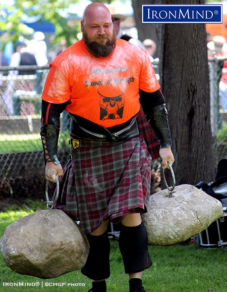 Brian Pennell on his way to victory in a hard-fought Dinnie Stones Walk at the 2018 IHGF Canadian Stones of Strength Championships. IronMind® | ©CHGF photo