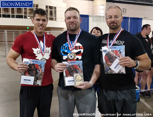 philly fitexpo armlifting roussin johnson magni Here are the top three, overall, from the Armlifting USA grip strength competition at the Philadephia FitExpo: (left to right) Eric Roussin (second), Jedd Johnson (first), Riccardo Magni (third). IronMind® | Photo courtesy of Armlifting USA