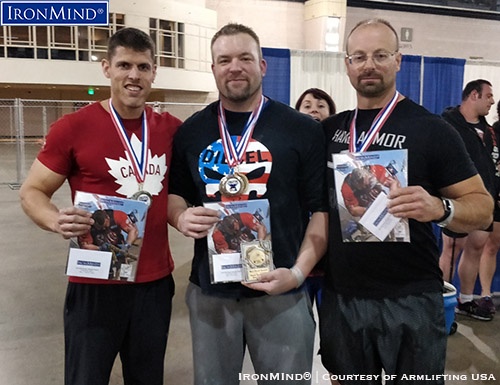 Here are the top three, overall, from the Armlifting USA grip strength competition at the Philadephia FitExpo: (left to right) Eric Roussin (second), Jedd Johnson (first), Riccardo Magni (third). IronMind® | Photo courtesy of Armlifting USA