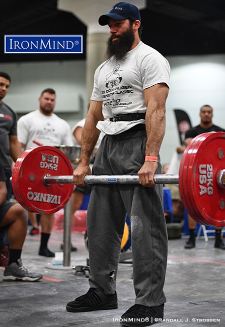 Devinlee Brown (USA) became the first man in the world to certify on the Crushed-To-Dust Challenge in 2019 when he demonstrated mastery of grip-strength test at the IronMind booth at the Los Angeles FitExpo, where he was competing the Armlifting USA event. Shown is Brown’s 170-kg double overhand deadlift on the Apollon’s Axle, a grip-strength staple. IronMind® | Randall J. Strossen photo 