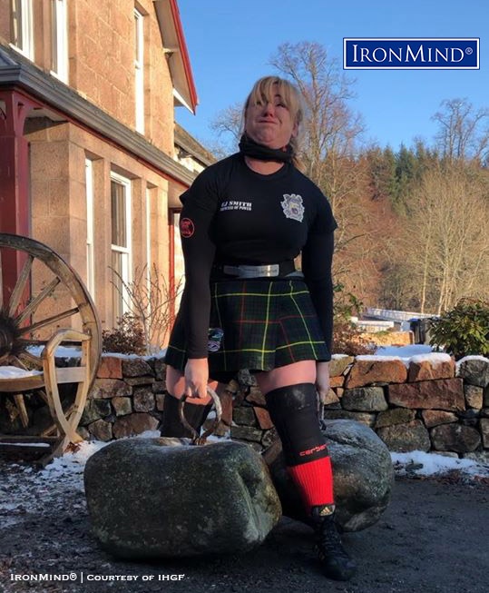 Scottish strongwoman Emmajane Smith made history by becoming the first woman in history to lift the Dinnie Stones barehanded. IronMind® | Courtesy of IHGF