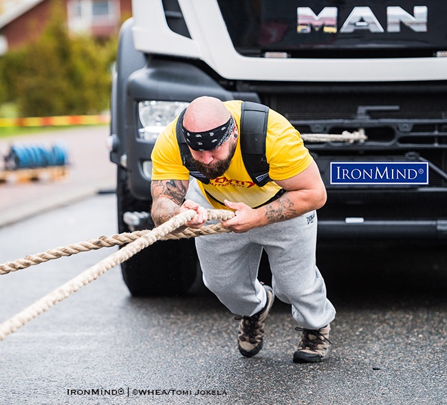 In the fifth edition of its drug-tested strongman/strongwoman world championships, WHEA drew competitors from several European countries as well as the USA to its contest in Hämeenlinna, Finland last weekend.  Men’s open class winner Paul Talbot (UK) on the truck pull at the 2019 WHEA World Strongman Championships. IronMind® | ©WHEA/Tomi Jokela