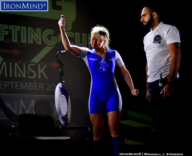 Svetlana Kornienko (Ukraine) won the CoC (Captains of Crush) Silver Bullet Hold in the women’s 80-kg class at the recent APL European Armlifting Cup. Team Ukraine is a powerhouse in armlifting and Kornienko is a consistent top performer internationally. Master referee Alexey Chizh (right) keeps a close eye on Kornienko’s position, ensuring a fair performance. IronMind® | ©Randall J. Strossen photo
