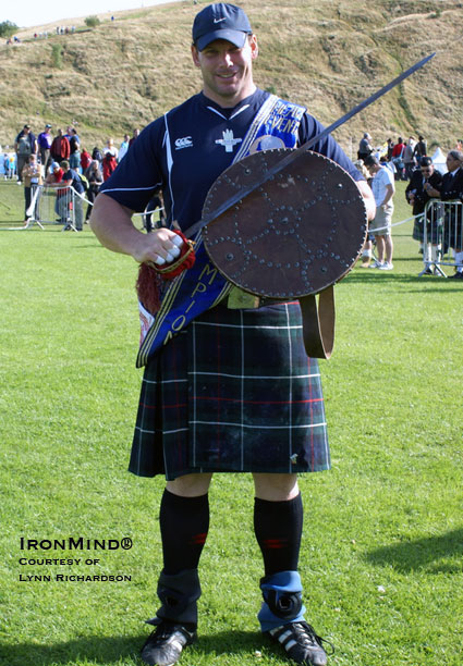 Sporting the champion’s sash, shield and sword, Aaron Neighbour is the proud 2009 Highland Games World Champion.  IronMind® | Photo courtesy of Lynn Richardson.