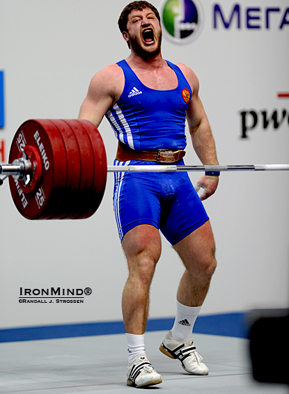 Roaring his approval, Khadzhimurat Akkaev (Russia) finished his six-for-six night with this 230-kg clean and jerk.  IronMind® | Randall J. Strossen photo.