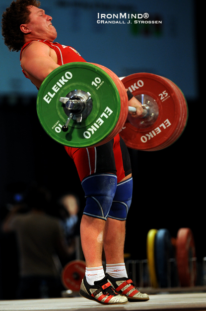 Andrei Aramnau cranks on his opening snatch, 195 kg, on his way to all three gold medals in the 105-kg class at the 2010 European Weightlifting Championships.  IronMind® | Randall J. Strossen photo.