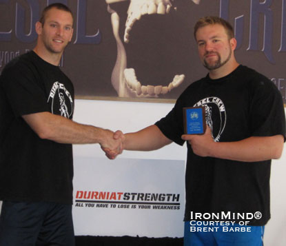Andrew Durniat (left) congratulates Jedd Johnson (right), winner of the 2010 U.S. Grip Strength National Championships.  IronMind® | Photo courtesy of Brent Barbe.
