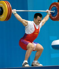 Zhang Gouzheng (China) on his way up with his 160 kg snatch. IronMind® | Randall J. Strossen, Ph.D. photo.
