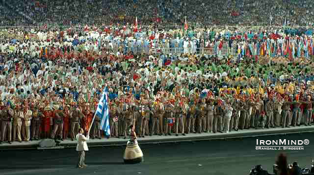 Greek weightlifting superstar Pyrros Dimas leads the parade of nations.  IronMind® | Randall J. Strossen, Ph.D. photo.