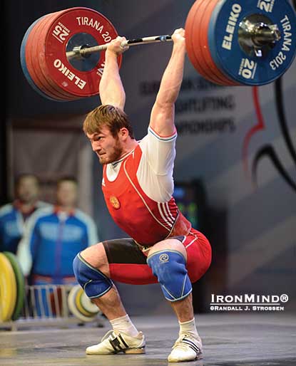 Apti Aukhadov destroyed this 215-kg clean and jerk as he swept the gold medals in the 85-kg category at the 2013 European Weightlifting Championships.  IronMind® | Randall J. Strossen photo.