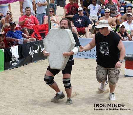 “A tradition of the ‘Beach’ is the Húsafell carry with a 300-pound cement replica of the Husafell stone.  This is done for distance with the loose sand adding a good measure of difficulty to this challenge!”  IronMind® | Photo courtesy of NAS/Sam McMahon.