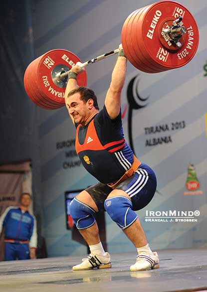 His power jerk is off the charts: David Bedzhanian blasted this 230-kg overhead on his way to defending his senior European 105-kg weightlifting title.  IronMind® | Randall J. Strossen photo