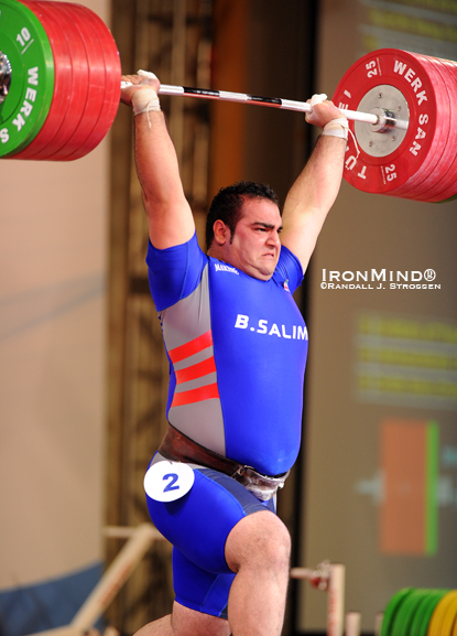 Punching this 245-kg jerk overhead, Behdad Salimi (Iran) won the superheavyweight class at the 2010 World Weightlifting Championships.  IronMind® | Randall J. Strossen photo.