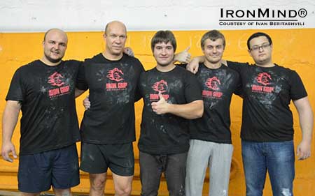 (Left to right) Pavel Khatuntsev, Alexander Yuzvik, Alexey Pritula, Vladimir Abrikosov and Ruben Piliposyan are part of the Iron Grip community and in a first, under the watchful eye of referee Alexei Ovsiannikov, all five took their official attempts on the IronMind Red Nail at the same time and all five succeeded.  IronMind® | Photo courtesy of Ivan Beritashvili