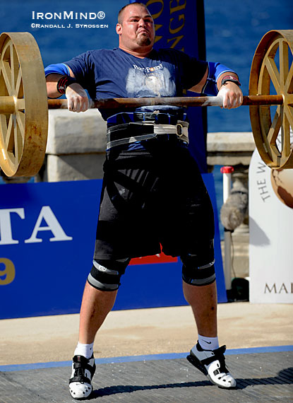 Who’s been coaching Brian Shaw?  Look at the extension as he cranks on the Overhead Axle Lift at the 2009 World’s Strongest Man contest.  IronMind® | Randall J. Strossen photo.