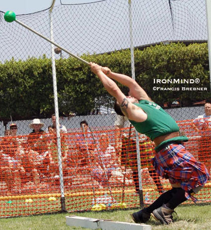 Getting long in the hammer, Larry Brock gets ready to launch another big throw.  IronMind® | File photo by Francis Brebner.