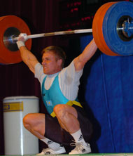 Sergey Filiminov (Kazakhstan) sinks the putt on this world record snatch (173 kg) in the 77-kg category at the 2004 Asian Weightlifting Championships (Almaty, Kazakhstan). IronMind® | Randall J. Strossen, Ph.D. photo.