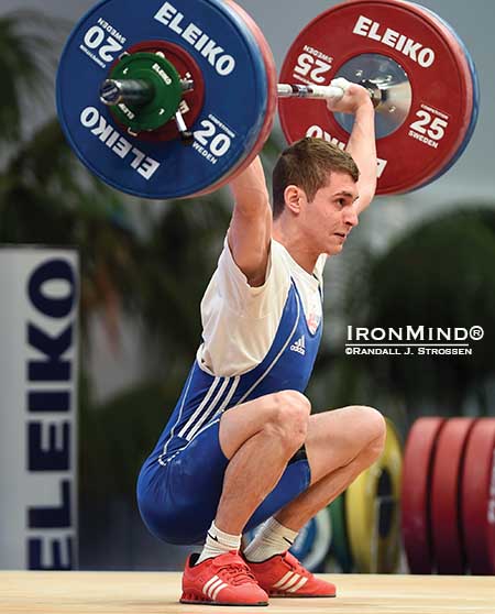 Easy does it: Florin Croitoru (Romania) made this gold medal 122-kg snatch and it paved the way to a gold medal in the total as well.  IronMind® | Randall J. Strossen photo
